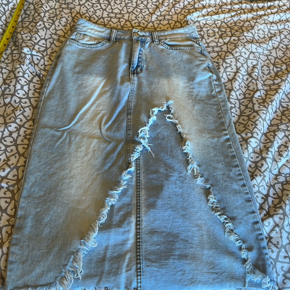 Sexy distressed jean skirt.
